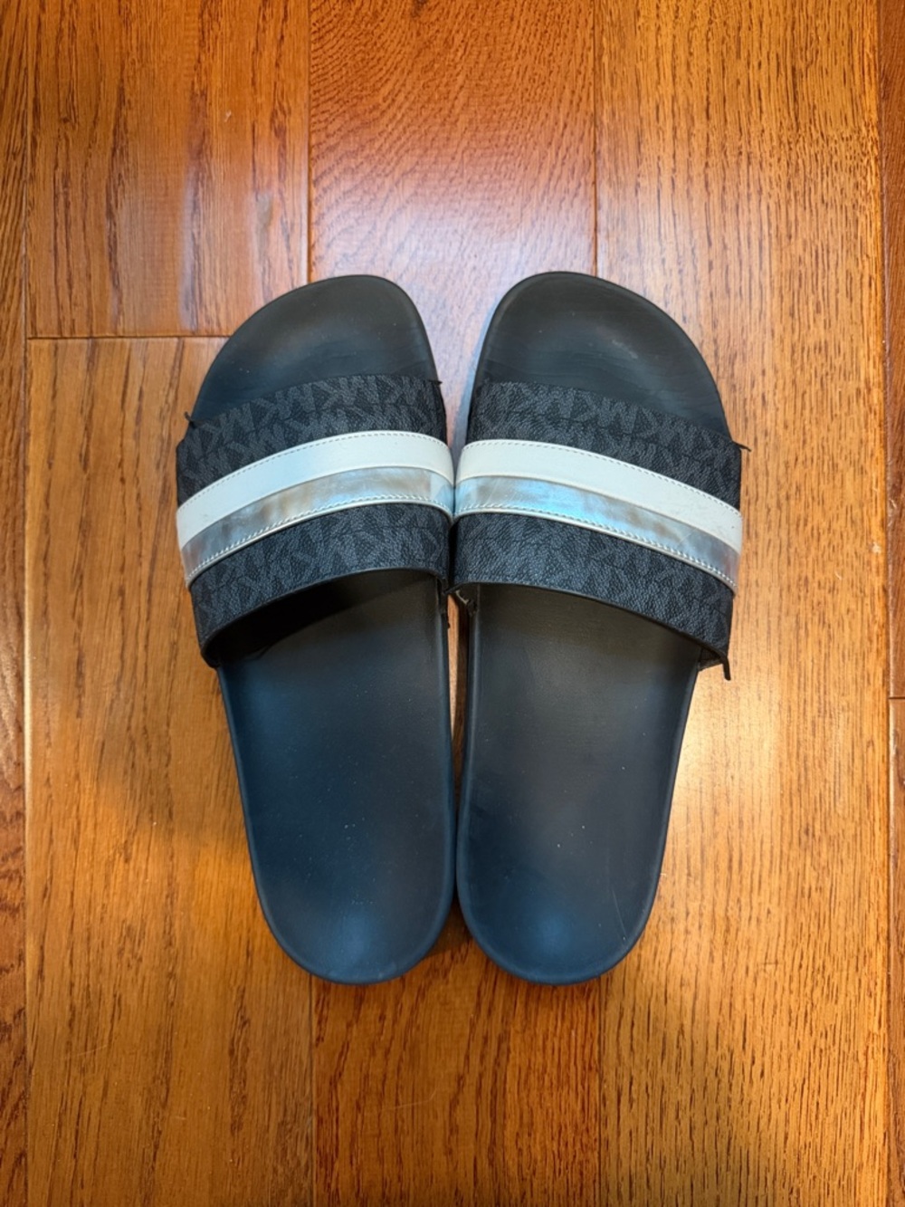 Michael Kors Black Slide Sandals with White and Silver Stripes